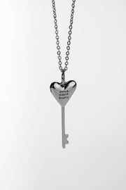 Прикраса ключ-серце "Любов варта всього" з латуні (об'ємне)