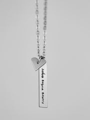 Сталева прикраса з серцем "Любов варта всього"